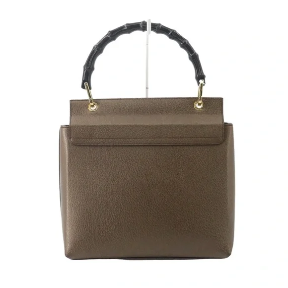🚫SOLD🚫✨💎VINTAGE💎✨ GUCCI BAMBOO BAG
IN METALLIC CHAMPAIGNE LEATHER! - Picture 2 of 15